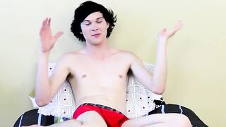Twink tugs on his massive cock and uses dildo on his ass