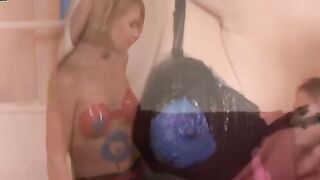 Dykes strip naked and paint each other before using sex toys