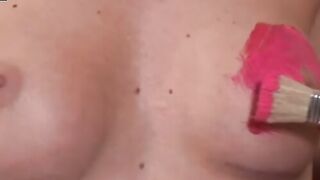 Dykes strip naked and paint each other before using sex toys