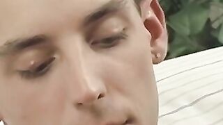 Tattooed twink KC Williams swallows throbbing cock in shower