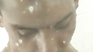 Tattooed twink KC Williams swallows throbbing cock in shower