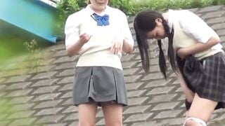 NipponPissTV.com - Two girls get caught pissing and filming each other outside public