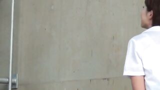 NipponPissTV.com - Cute Jap schoolgirl with pigtails pisses in the wind outdoors