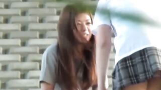 NipponPissTV.com - Cute Jap schoolgirl with pigtails pisses in the wind outdoors