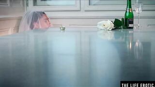 African bride wears her veil while she fucks herself with a bottle