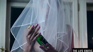 African bride wears her veil while she fucks herself with a bottle