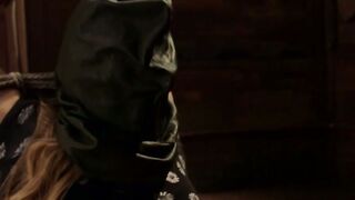 Blonde in wooden stock pussy fucked
