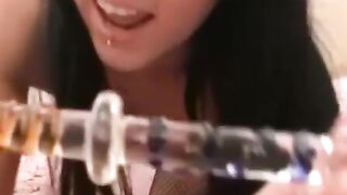 Dark haired Chloe James drills her pussy with big dildo