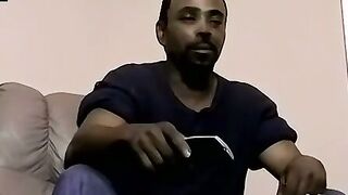 Ebony male strips to reveals his fat cock and plays with it