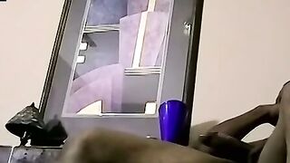 Ebony male strips to reveals his fat cock and plays with it