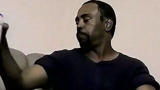 Ebony male strips to reveals his fat cock and plays with it