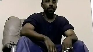 Ebony male strips to reveals his fat cock and plays with it
