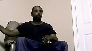 Ebony male strips to reveals his fat cock and plays with it