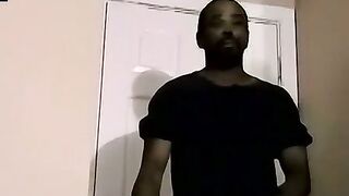 Ebony male strips to reveals his fat cock and plays with it