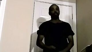 Ebony male strips to reveals his fat cock and plays with it