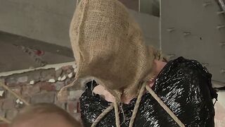 Bound and blind folded slave enjoys a handjob from master