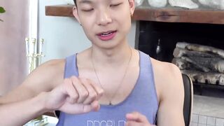 Sweet looking twink Kai Cho tugs his meaty bulge and cums all over himself