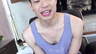 Sweet looking twink Kai Cho tugs his meaty bulge and cums all over himself
