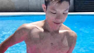 Sweet looking twink Kai Cho tugs his meaty bulge and cums all over himself