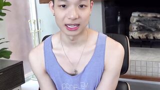 Sweet looking twink Kai Cho tugs his meaty bulge and cums all over himself