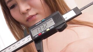 Busty Japanese Curvy Kurumi is playing with her pussy in front of the camera