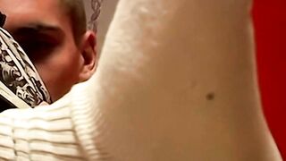 Evan Heinze plays with his feet in his socks before revealing his sexy bare soles