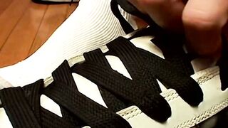 Evan Heinze plays with his feet in his socks before revealing his sexy bare soles