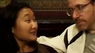 Sensual Asian teen has her ass fucked by two guys on couch