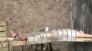 Bound young twink enjoys handjob from mature master