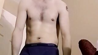 Homo is playing with his shaft and cums while watching porn