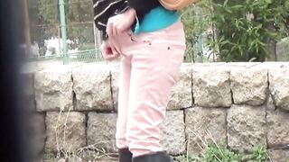 NipponPissTV.com - Real Japanese lady filmed while peeing in closeup outdoors