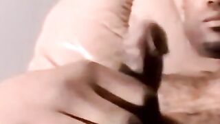 Amateur black dude strips and jacks off his raging cock