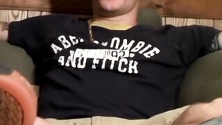 Handsome young man Glock rubbing his cock head on his sexy feet