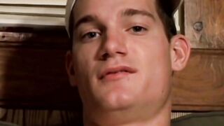 Handsome young man Glock rubbing his cock head on his sexy feet