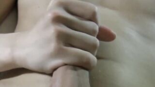 Japanese twink gently masturbates while wearing cock ring