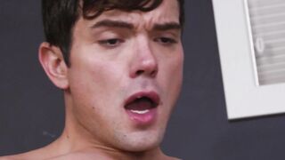 Inked young man rides a massive cock while masturbating