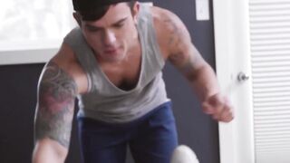 Inked young man rides a massive cock while masturbating