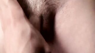 Cocky twink Sean busts a load of cum while watching porn