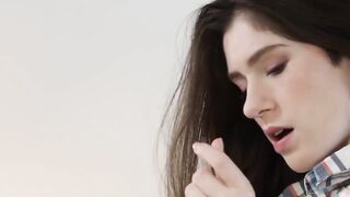 Sensual brunette Pearl lubes up her dildo with her mouth and stuffs her pussy with it