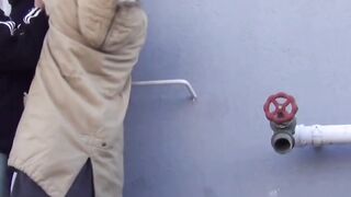 Young Asian cutie outdoors tied up and pees from the ladders