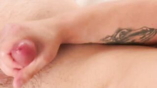 Inked horny twink Julian wanks off solo while watching porn