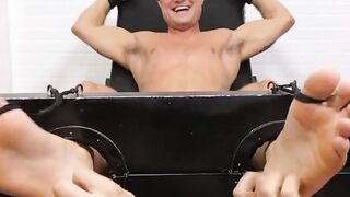 MaleFeetXXX.com - Restrained hunk AJ Stud's squirms in a tickle torment by a hairy gu
