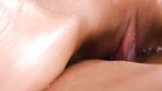 Oily busty Asian masseuse milks big black dick