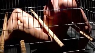 MuscleJockBound.com - Blindfolded muscle slave tormented and teased in a cage by a do