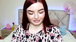 Redhead amateur babe shows tattoos