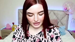 Redhead amateur babe shows tattoos