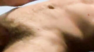 Fit guy Ethan Storm fucks his powerful hand til massive cum explodes
