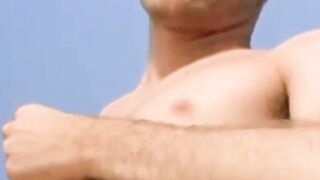 Fit guy Ethan Storm fucks his powerful hand til massive cum explodes