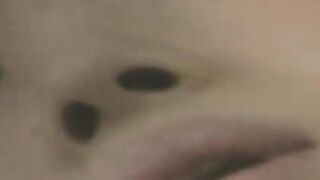Tiny Japanese babe moistens her panties with pussy juices