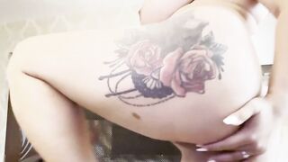 Blonde tattooed girl fingering ass and pussy